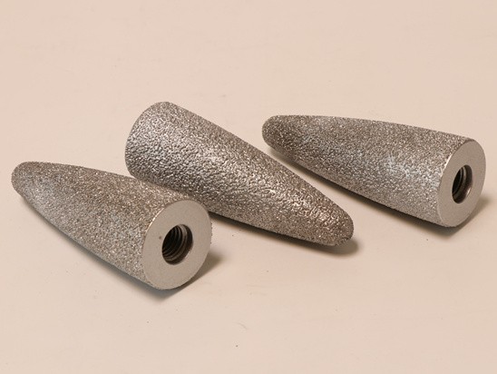 Vacuum brazed diamond mounted pins