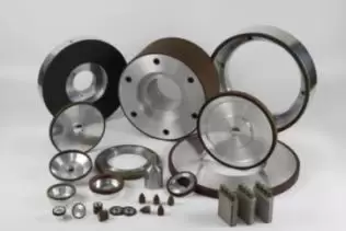 Grinding titanium alloy