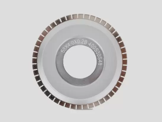 Electroformed hub type diamond dicing blade for semiconductor packaging